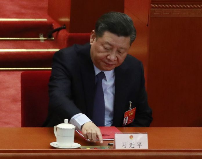 Xi