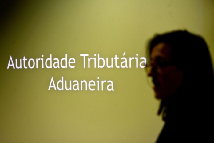 AT