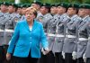 Merkel volta a tremer em público. É a terceira vez no último mês