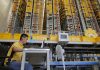 Indústria chinesa cresce ao ritmo mais lento desde 2002 face a disputas com EUA